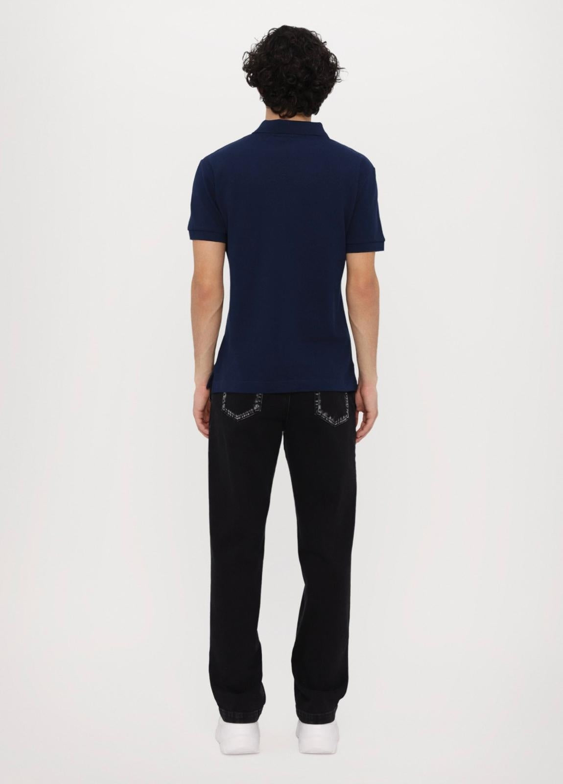 Polo Versace Jeans Couture in pique con logo in metallo uomo