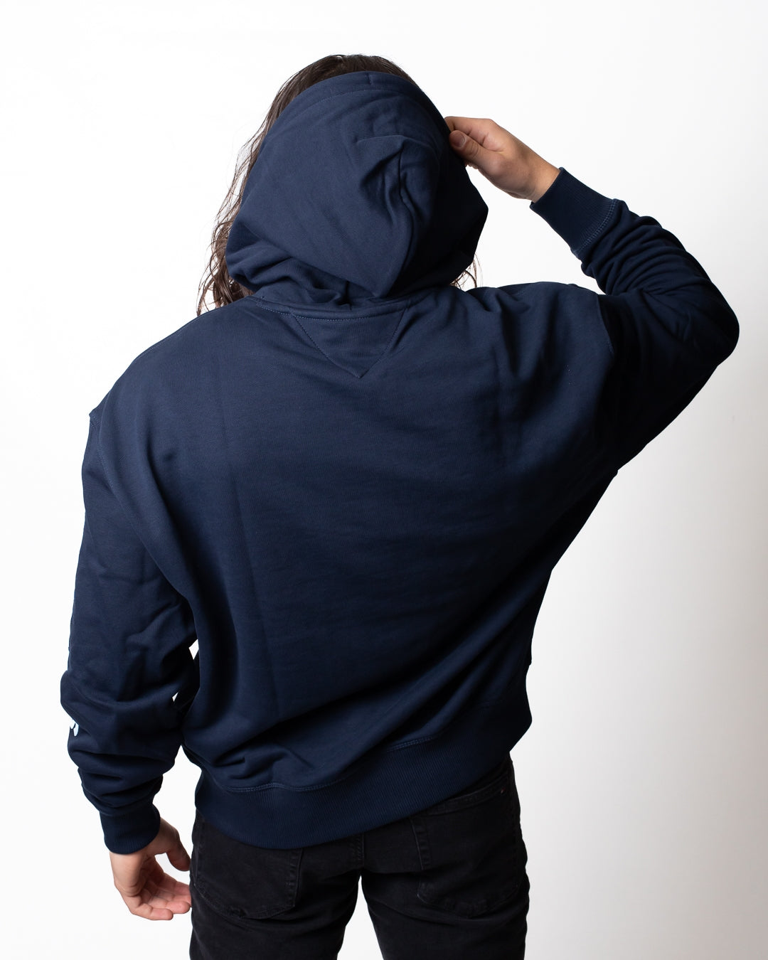Felpa Tommy Jeans con cappuccio e logo in rilievo uomo
