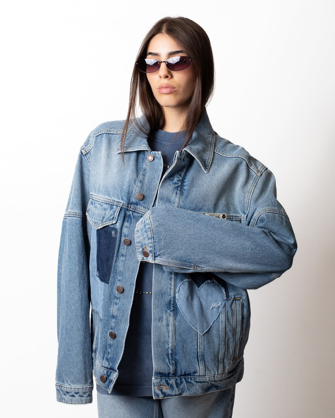 Giubbotto Moschino in denim con patch
