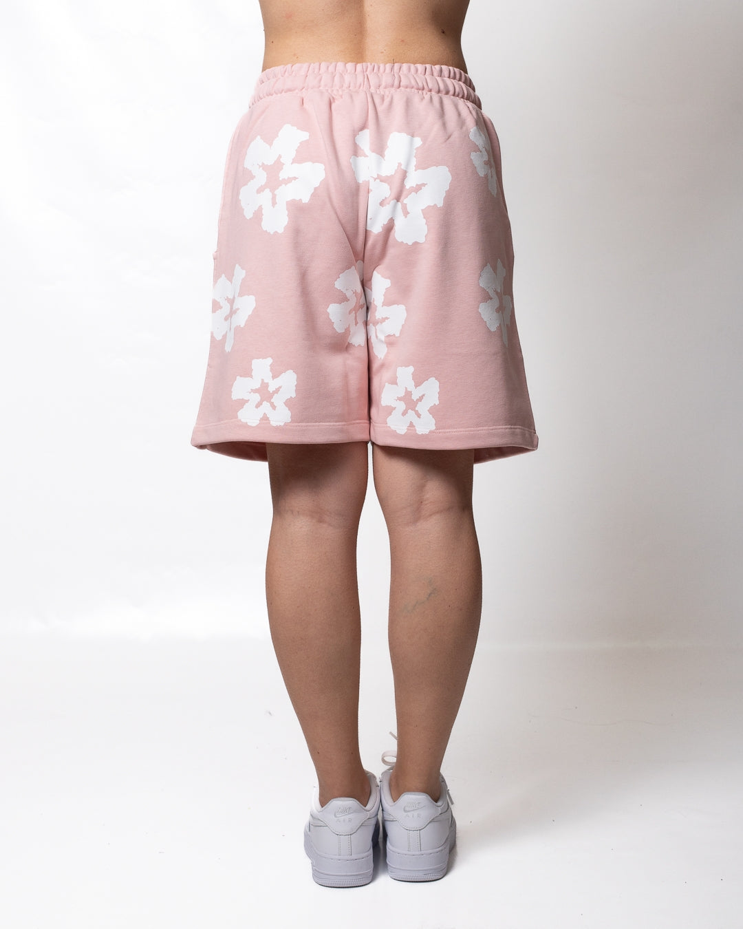 Bermuda Comme des Fuckdown in felpa con fiori all-over donna
