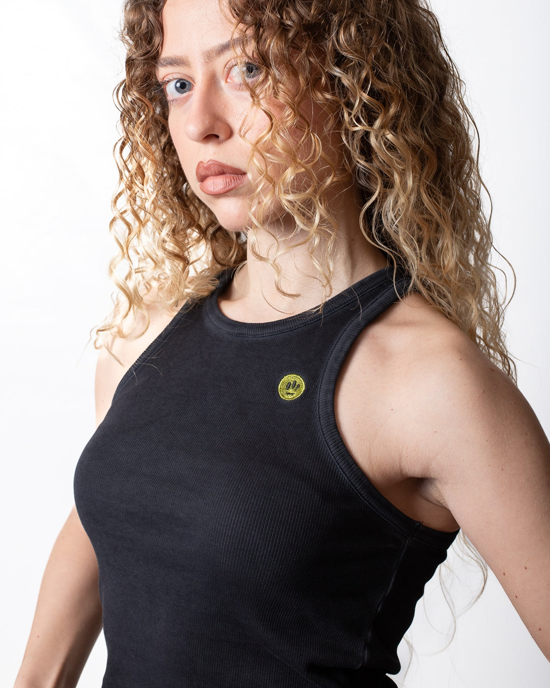 Top Barrow in costina con smile ricamato donna