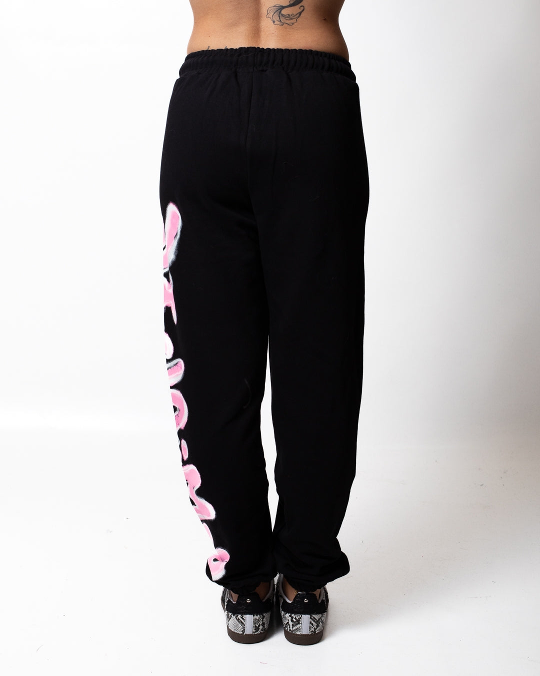 Pantalone Disclaimer in felpa con logo glitterato donna