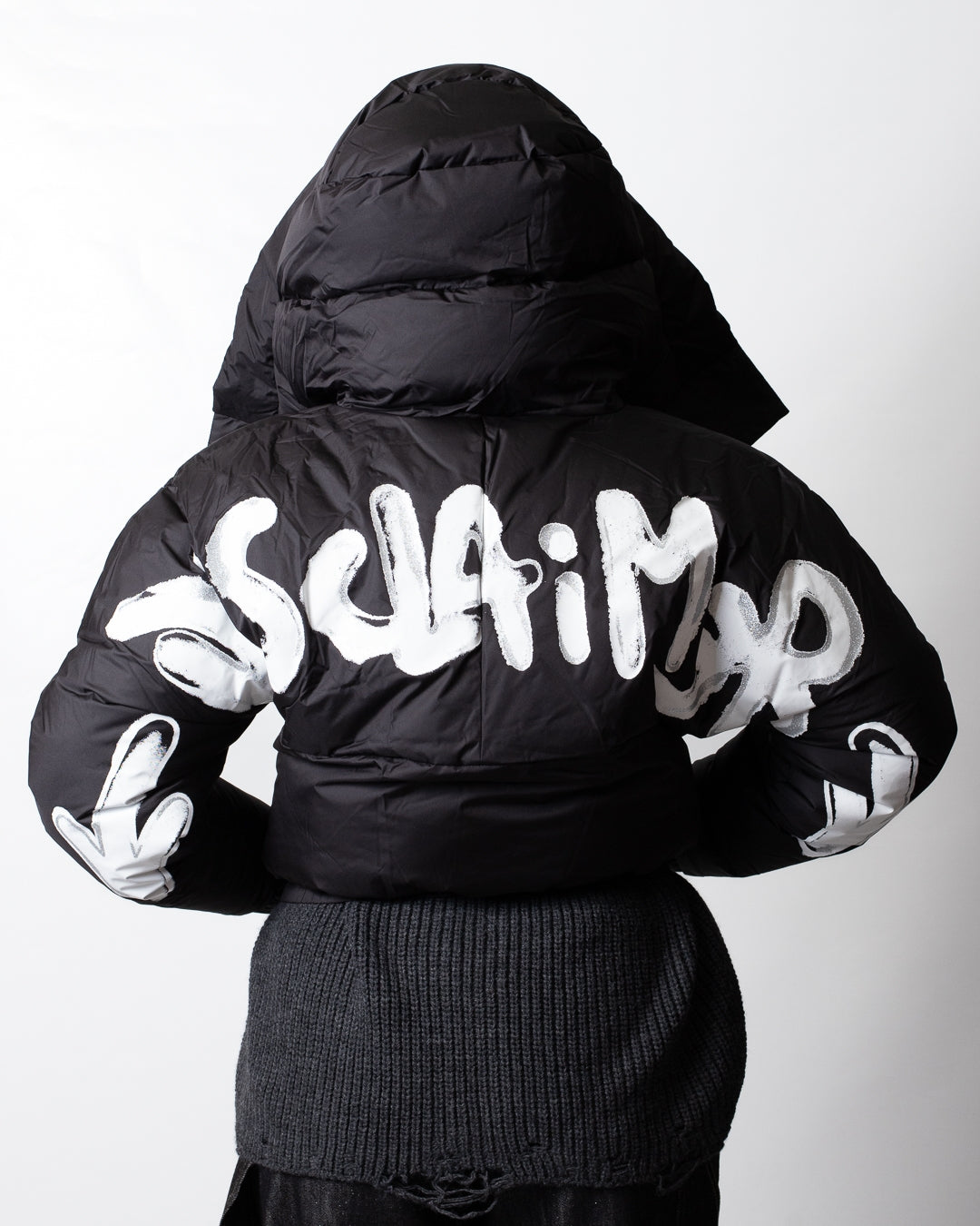 Piumino Disclaimer puffer con dettagli maculati donna