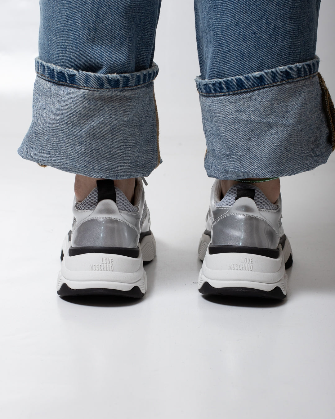 Sneakers Love Moschino in rete con dettagli lucidi donna