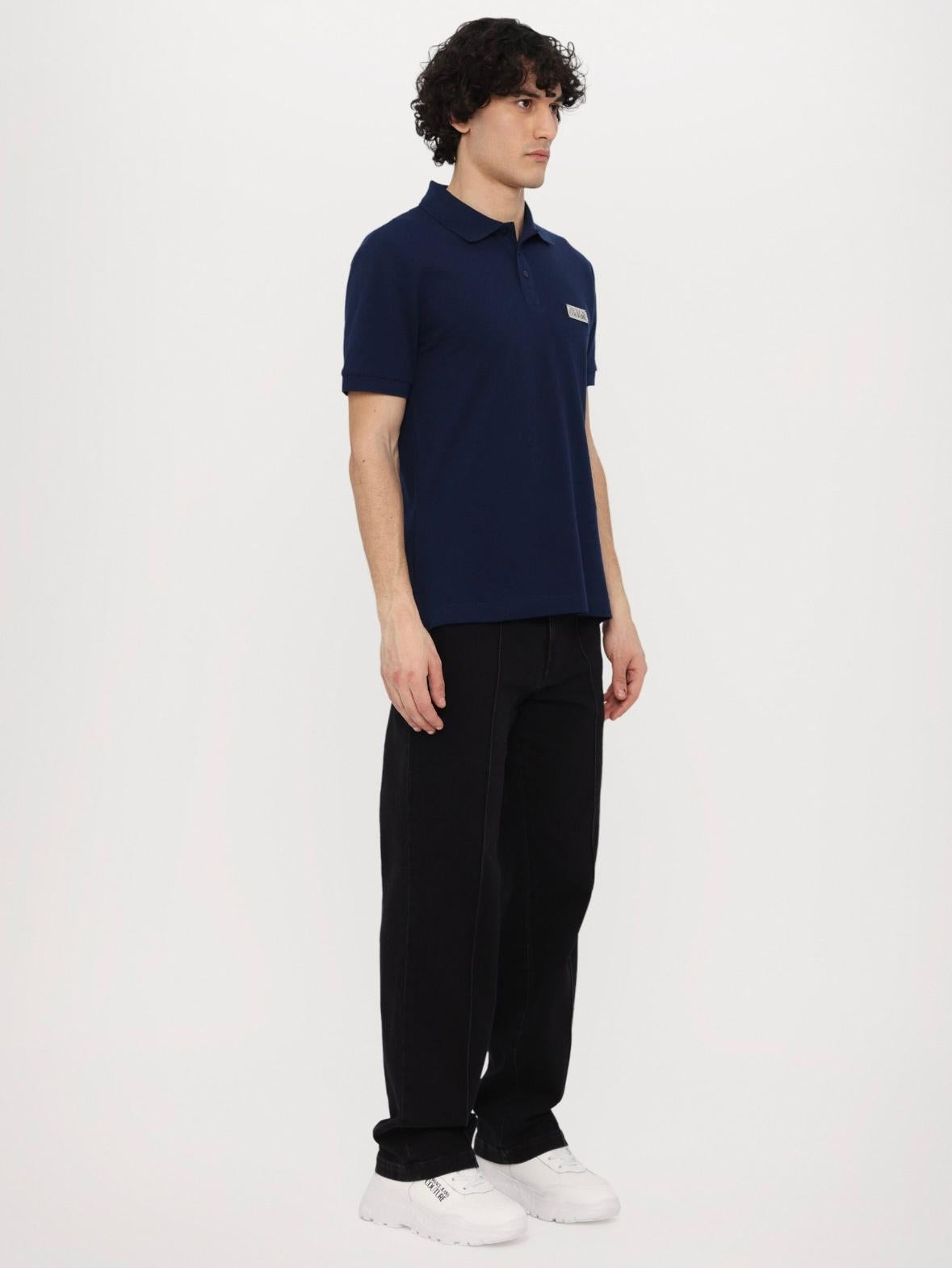 Polo Versace Jeans Couture in pique con logo in metallo uomo