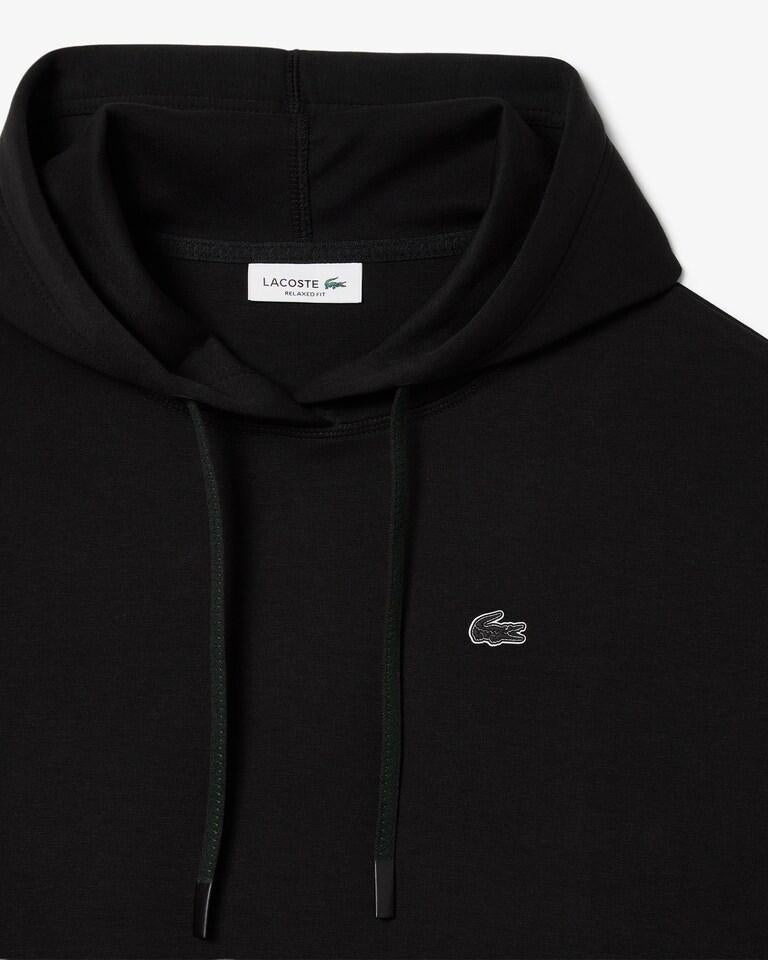 Felpa Lacoste cropped con cappuccio e logo in silicone donna