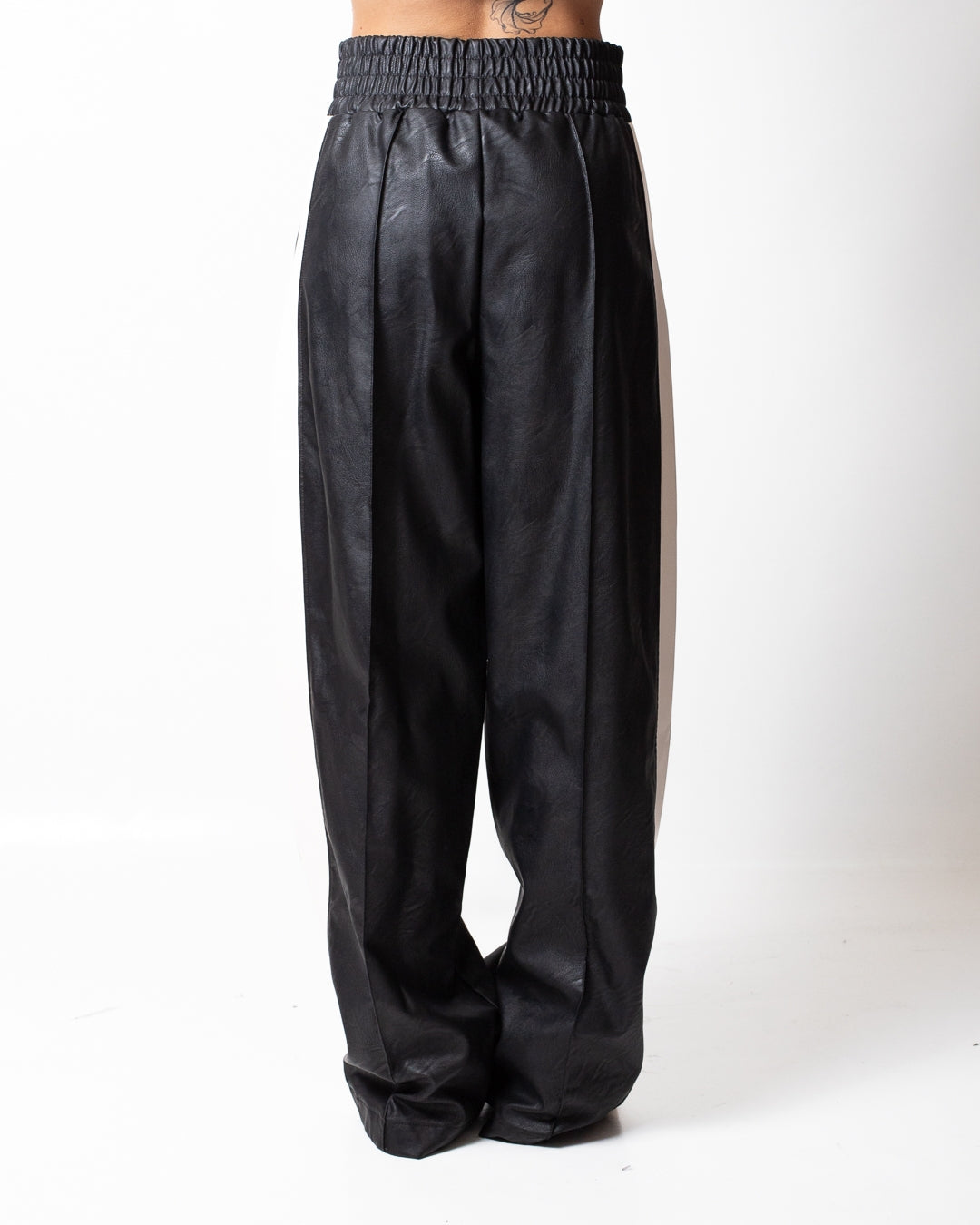 Pantalone Comme des Fuckdown in pelle con patch donna