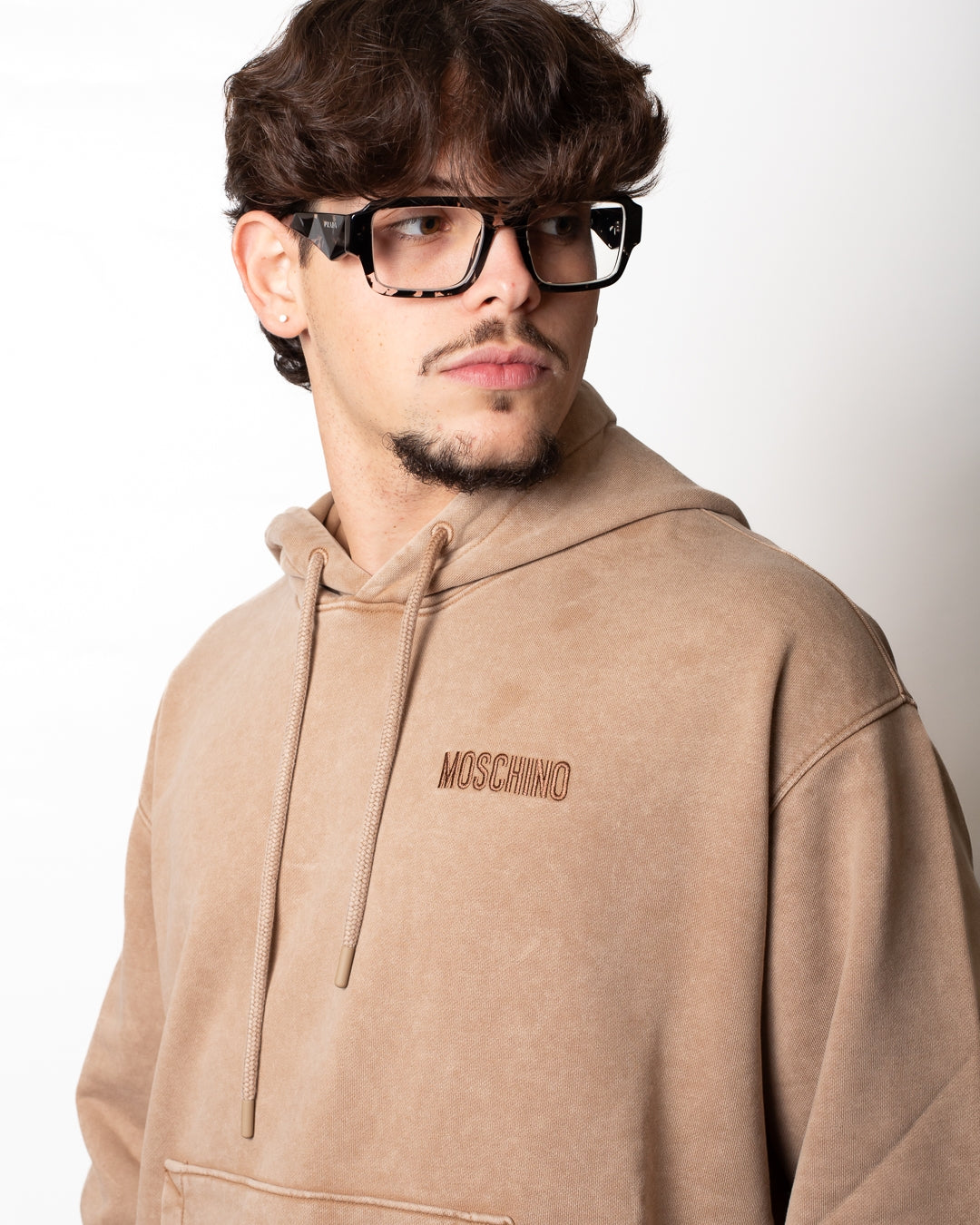 Felpa Moschino "Smiley" con cappuccio e borchie
