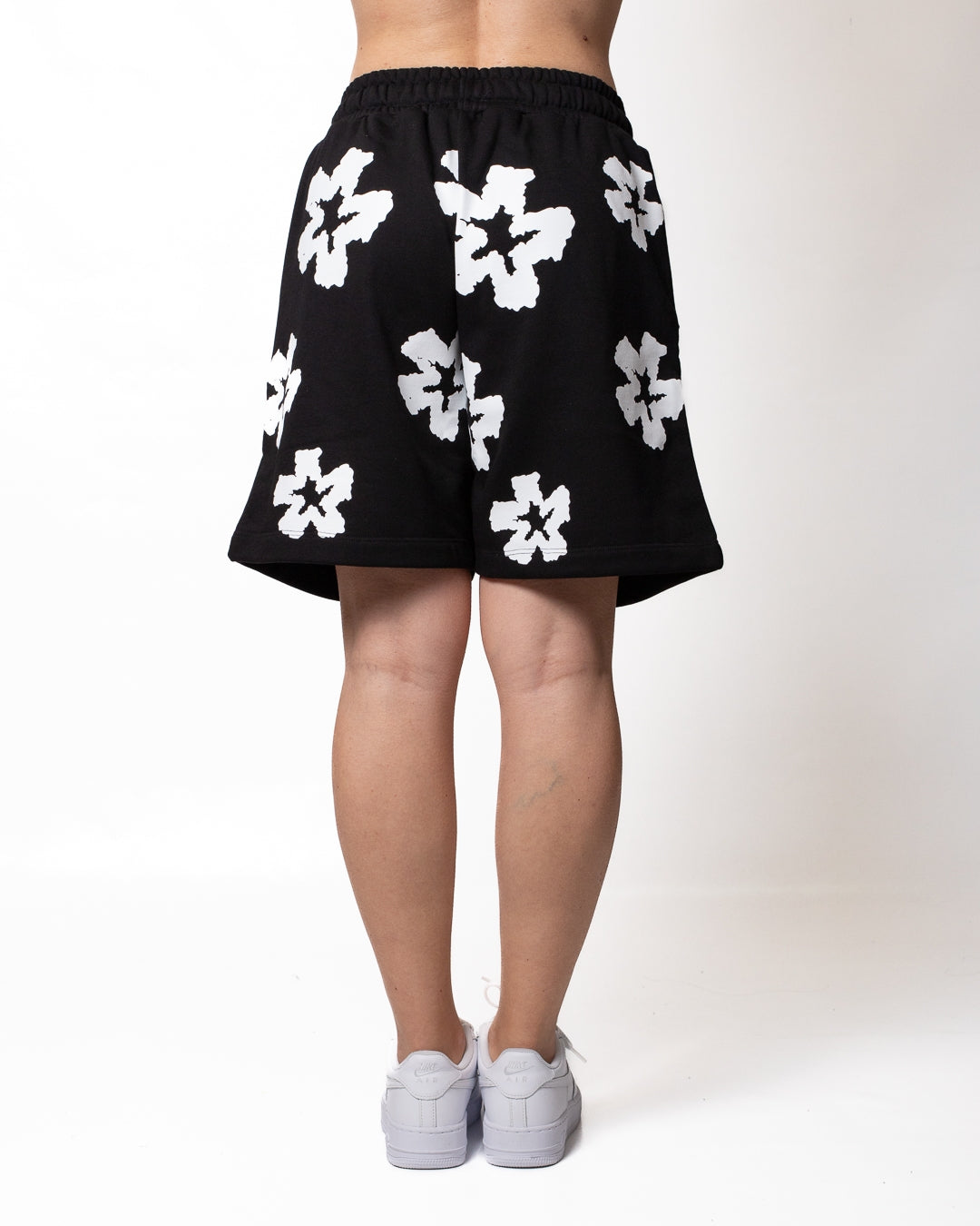 Bermuda Comme des Fuckdown in felpa con fiori all-over donna