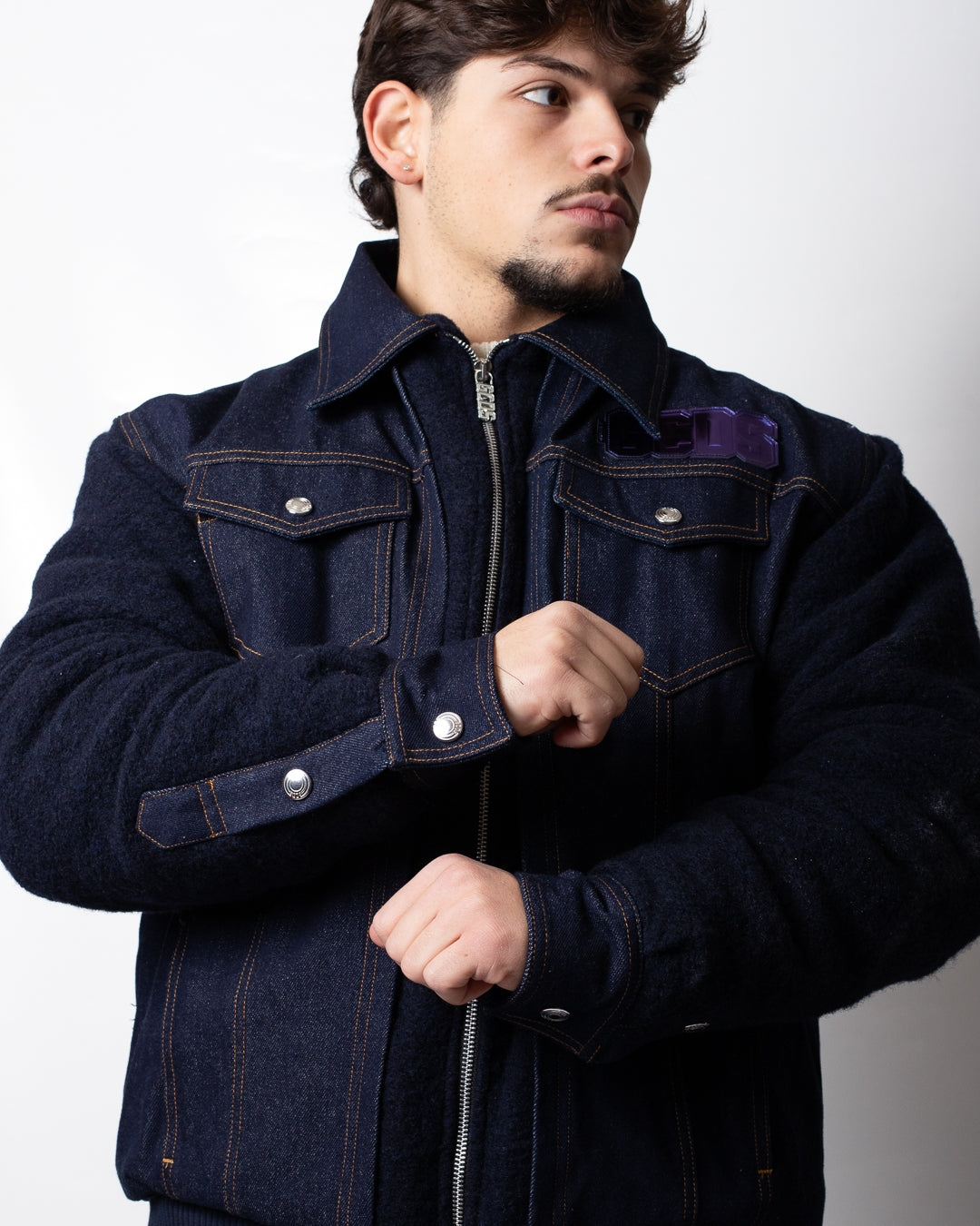 Giubbotto GCDS in denim con maniche in lana
