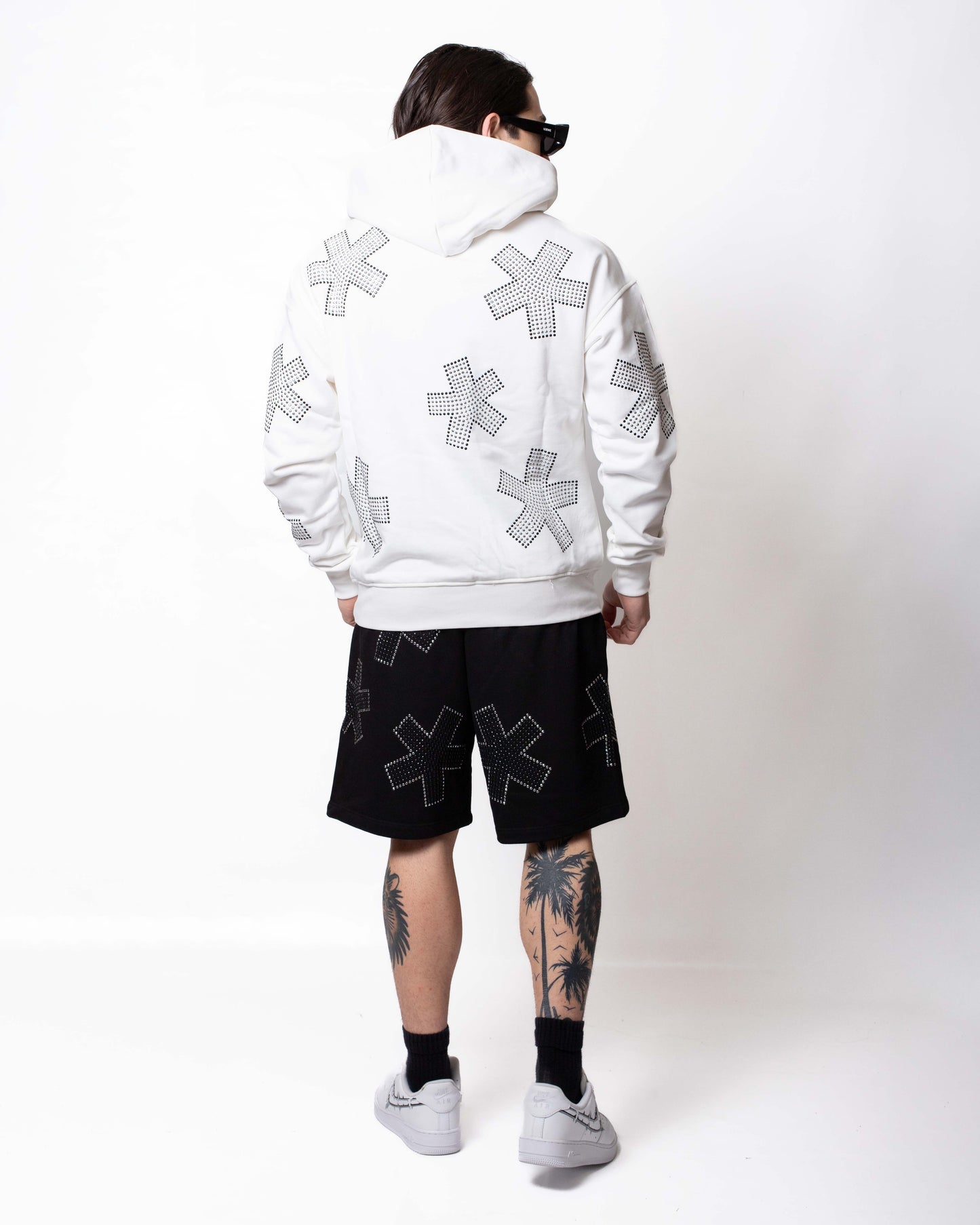 Felpa Comme des Fuckdown con cappuccio e strass all-over uomo