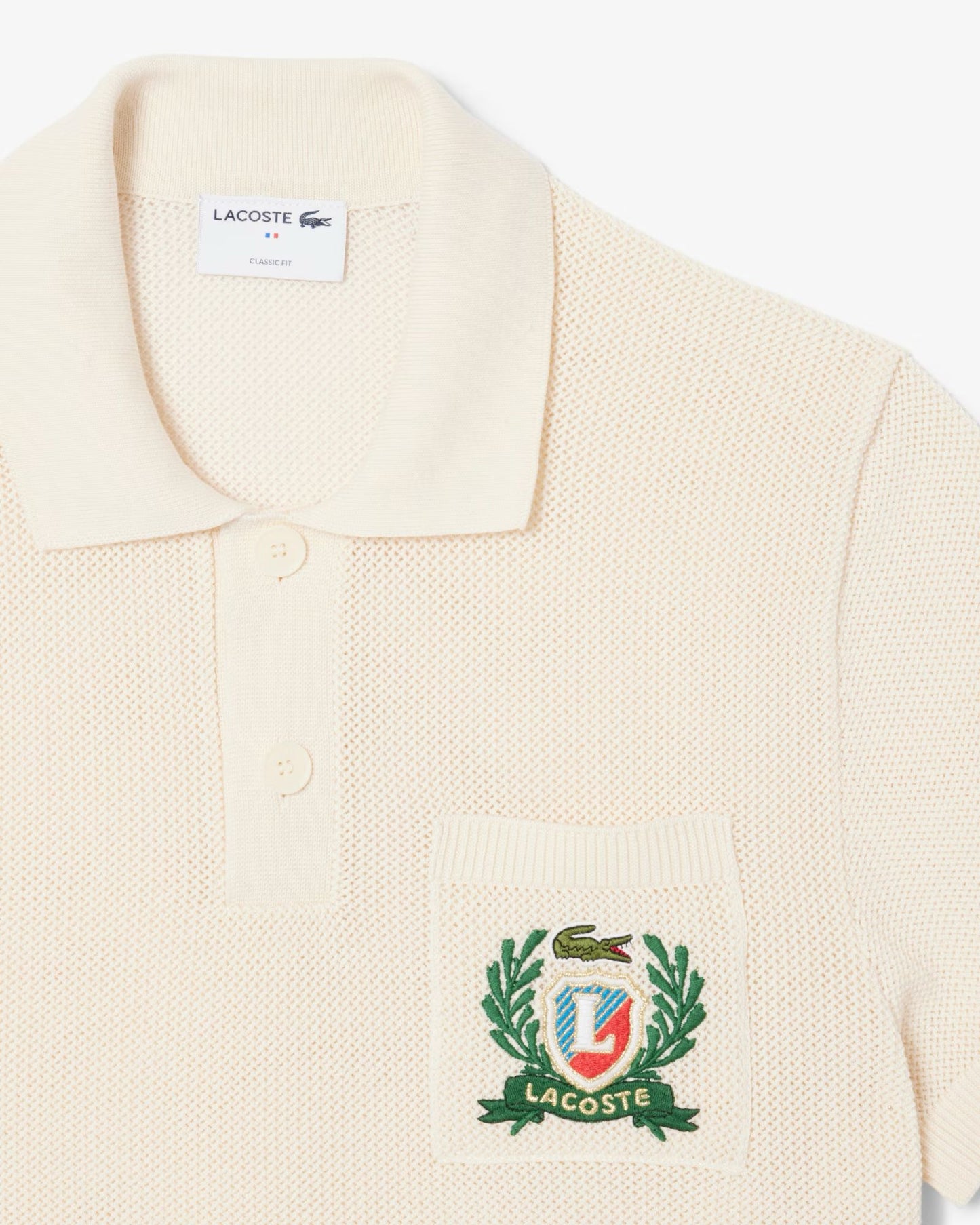 Polo Lacoste in maglia con logo ricamato