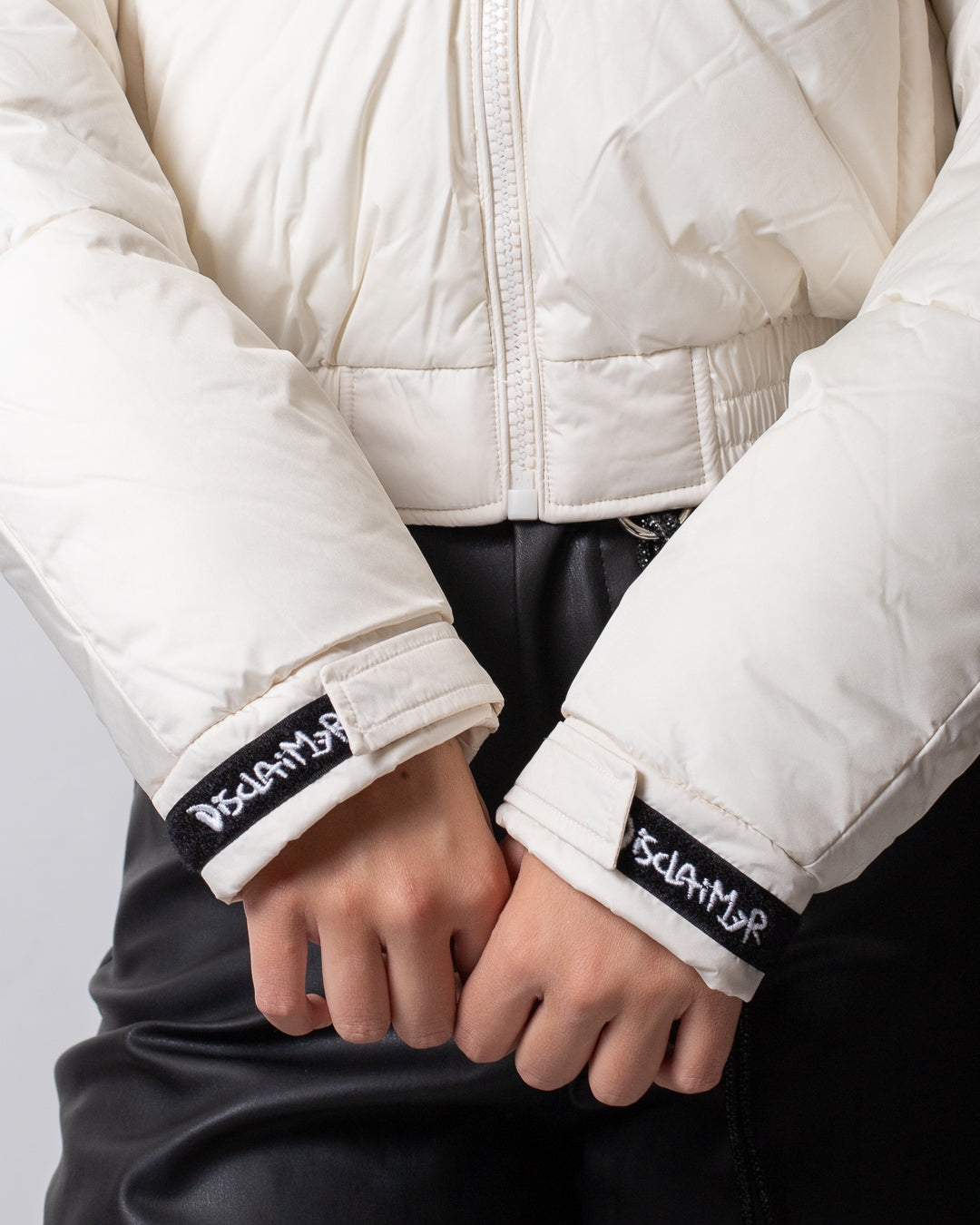 Piumino Disclaimer puffer con dettagli maculati donna