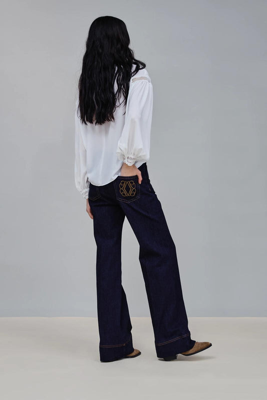 Jeans Nenette flare con dettagli oro