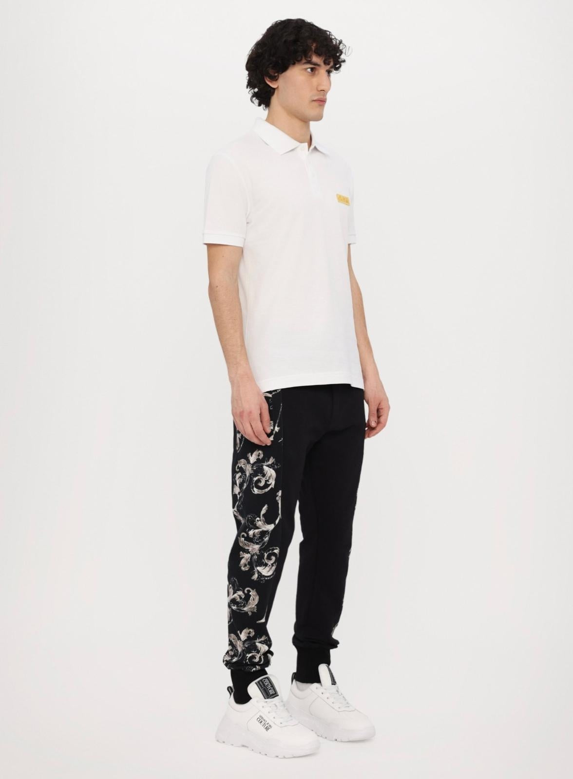 Polo Versace Jeans Couture in pique con logo in metallo uomo