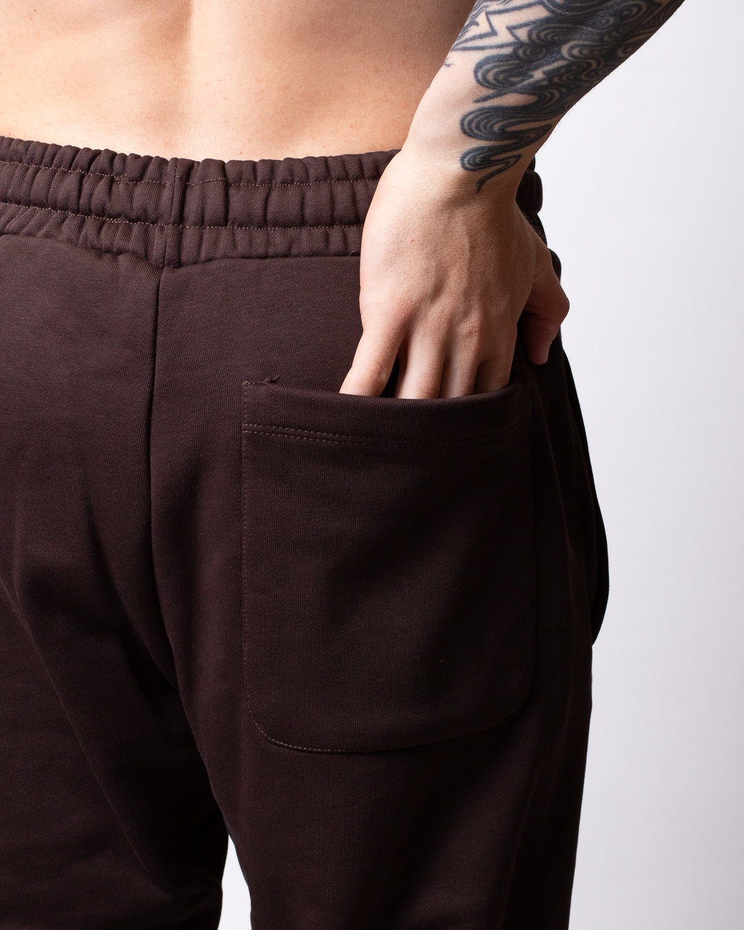 Pantalone Comme des Fuckdown in felpa con logo gothic uomo