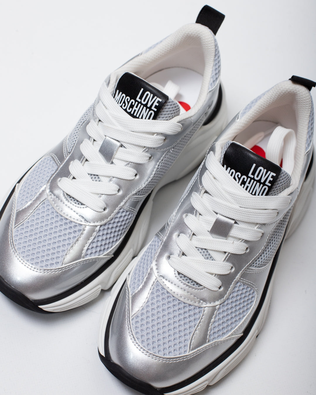 Sneakers Love Moschino in rete con dettagli lucidi donna