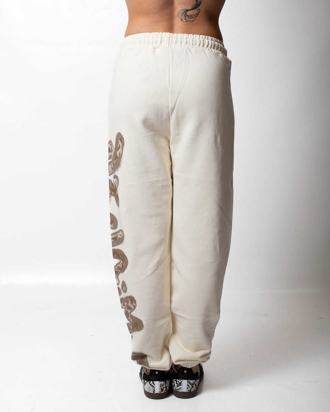 Pantalone Disclaimer in felpa con logo glitterato donna