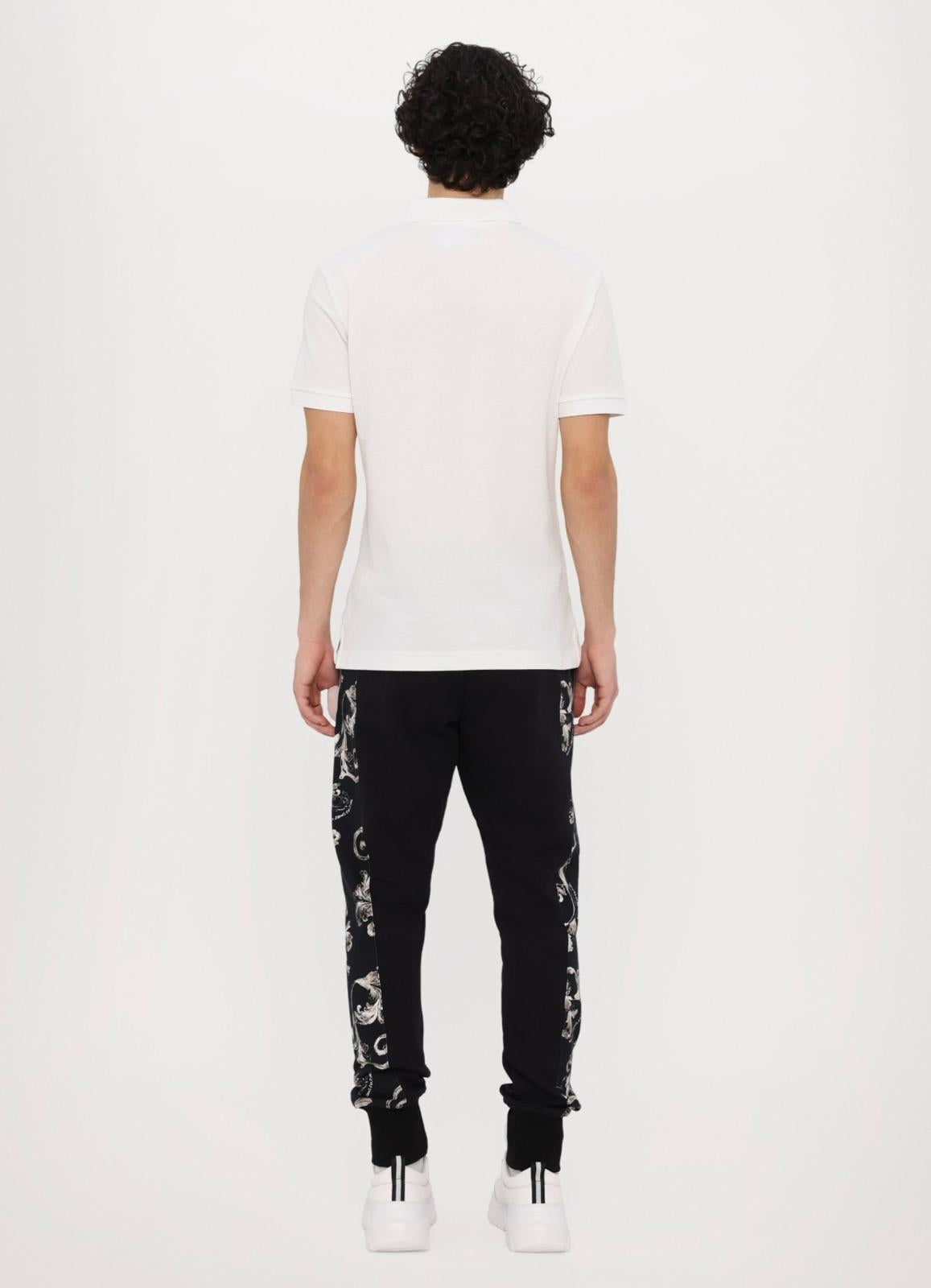 Polo Versace Jeans Couture in pique con logo in metallo uomo