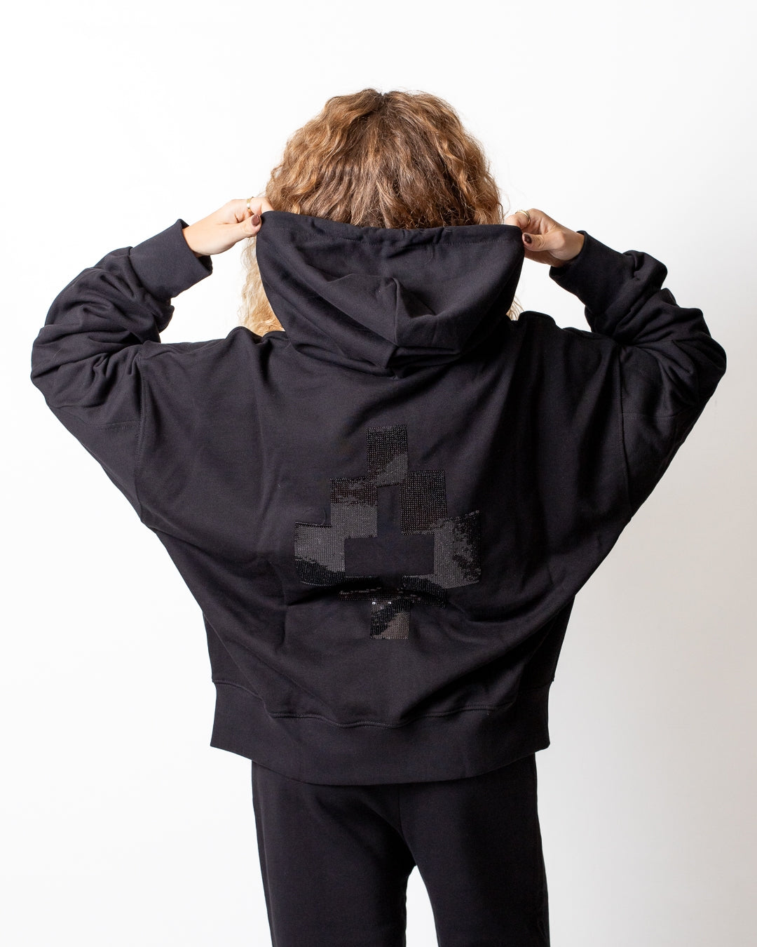 Felpa Marcelo Burlon fullzip con cappuccio e paillettes donna