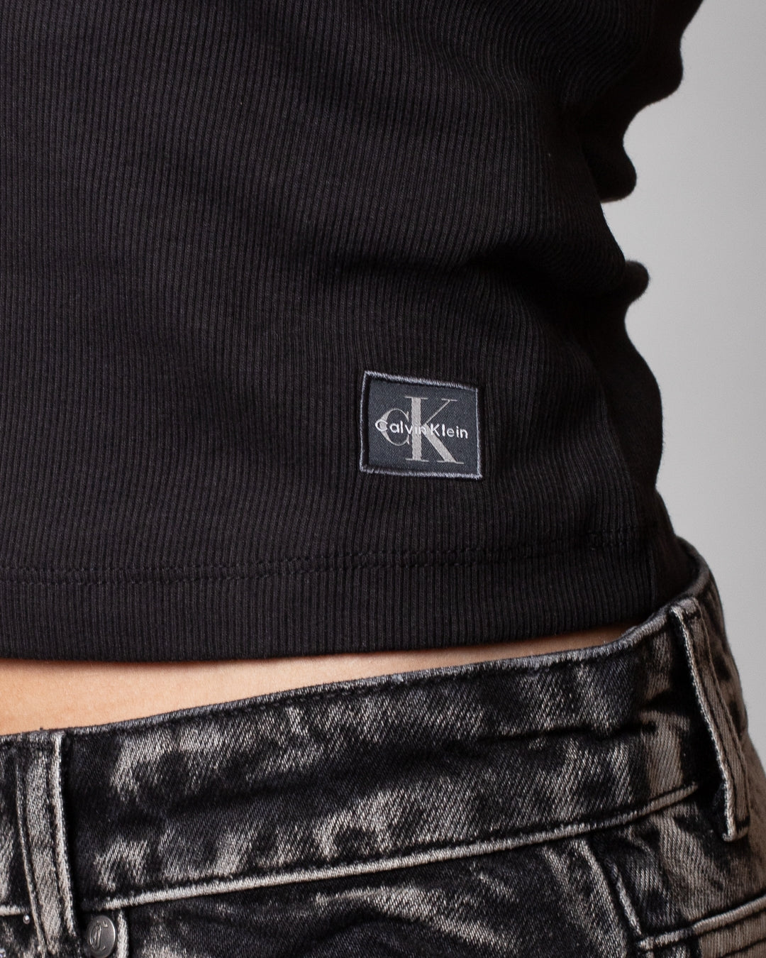 Top Calvin Klein Jeans in costina con mezza zip donna
