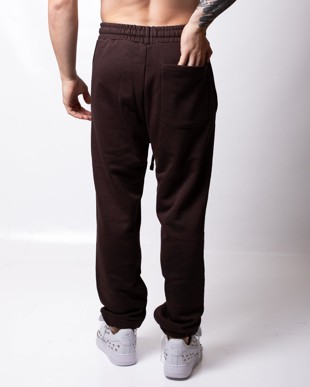 Pantalone Comme des Fuckdown in felpa con logo gothic uomo