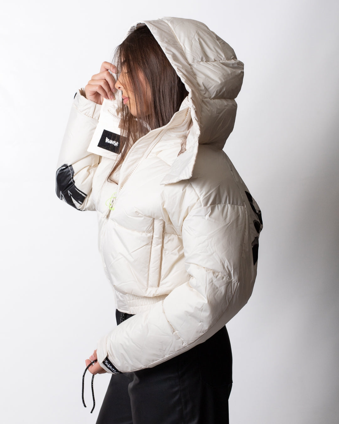 Piumino Disclaimer puffer con dettagli maculati donna