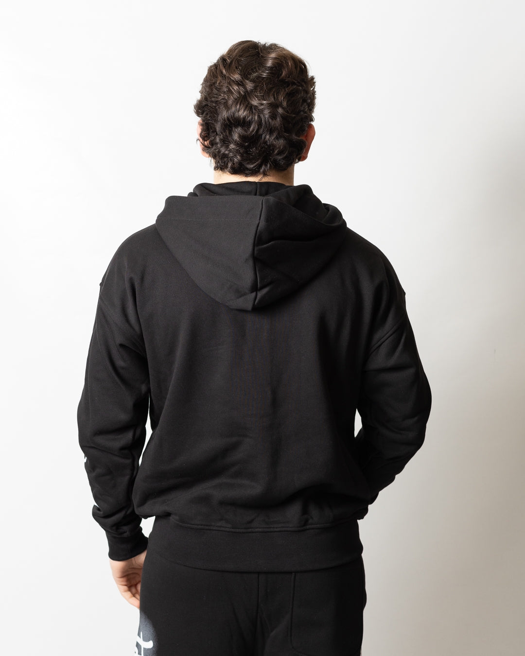 Felpa Comme des Fuckdown fullzip con cappuccio e stampa spray uomo