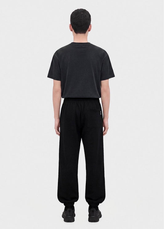 Pantalone Palm Angels baggy fit con logo stampato a contrasto