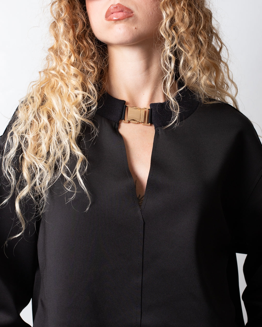 Blusa Nenette con placchetta donna