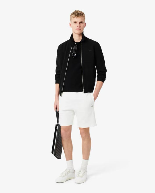 Bermuda Lacoste in felpa con fasce logate uomo