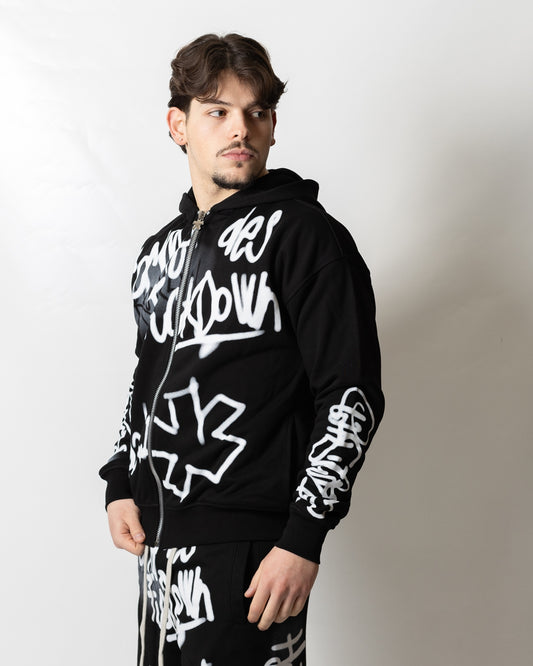 Felpa Comme des Fuckdown fullzip con cappuccio e stampa spray uomo