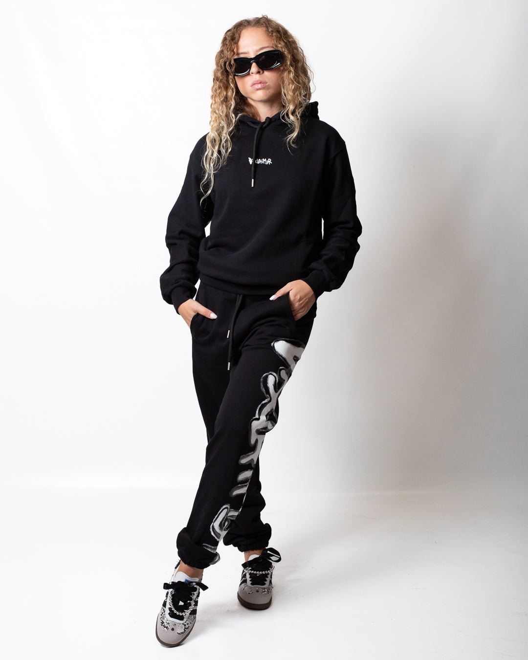 Pantalone Disclaimer in felpa con logo glitterato donna
