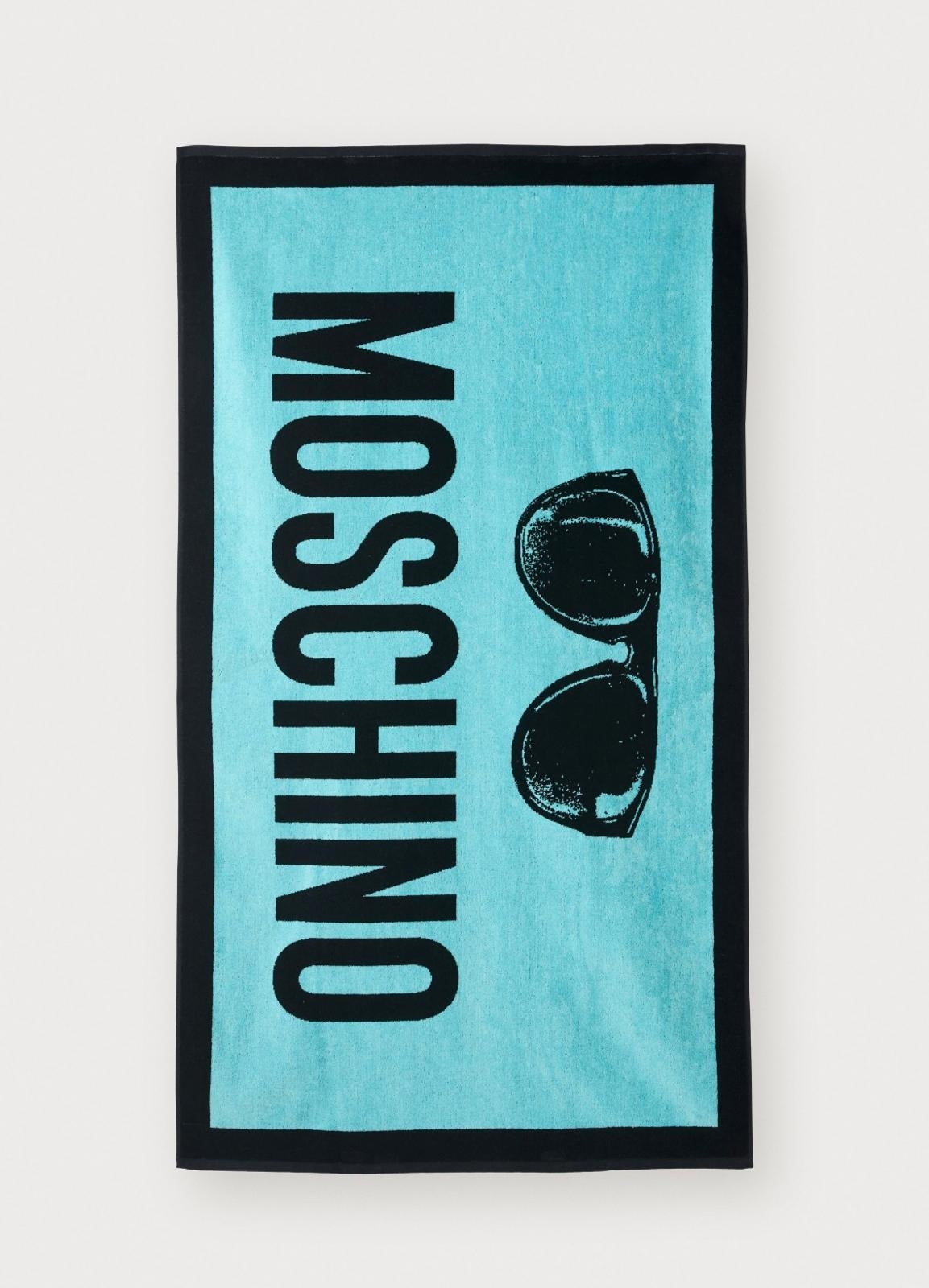 Telo mare Moschino Beachwear con logo e grafica a contrasto