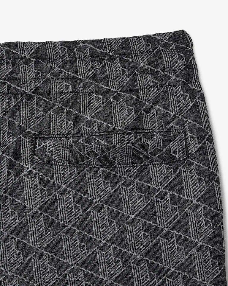 Pantalone Lacoste logato allover uomo