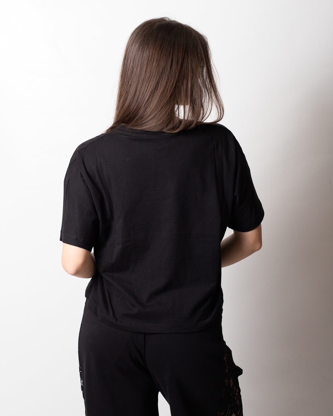 T-Shirt Disclaimer cropped con logo glitter donna