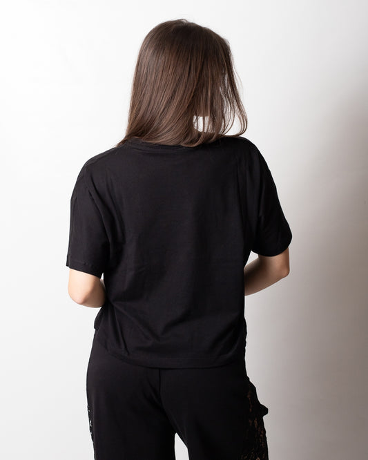 T-Shirt Disclaimer cropped con logo glitter donna