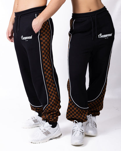 Pantalone Sprayground "brown check" con logo stampato e patch decorativa