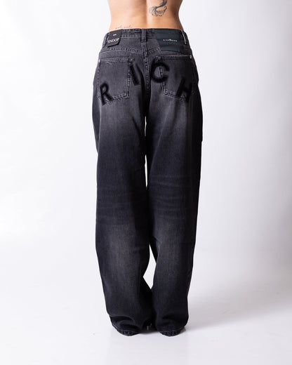 Jeans John Richmond con logo patch "Rich" in velluto