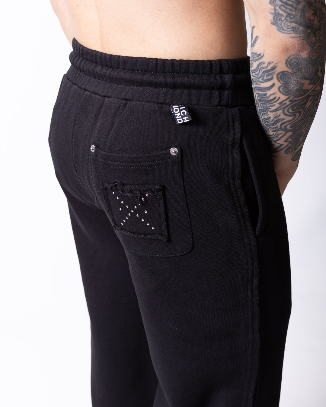 Pantalone Richmond X con applicazioni e dettagli taglio vivo