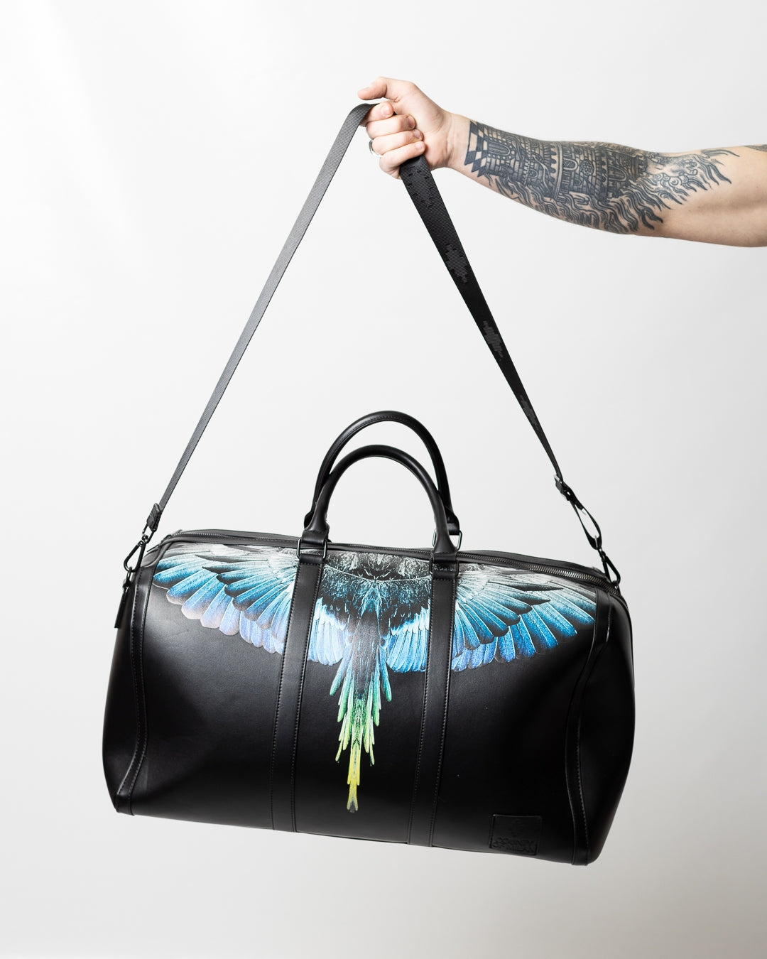 Borsone Marcelo Burlon in ecopelle "Icon Wings Royal" logato