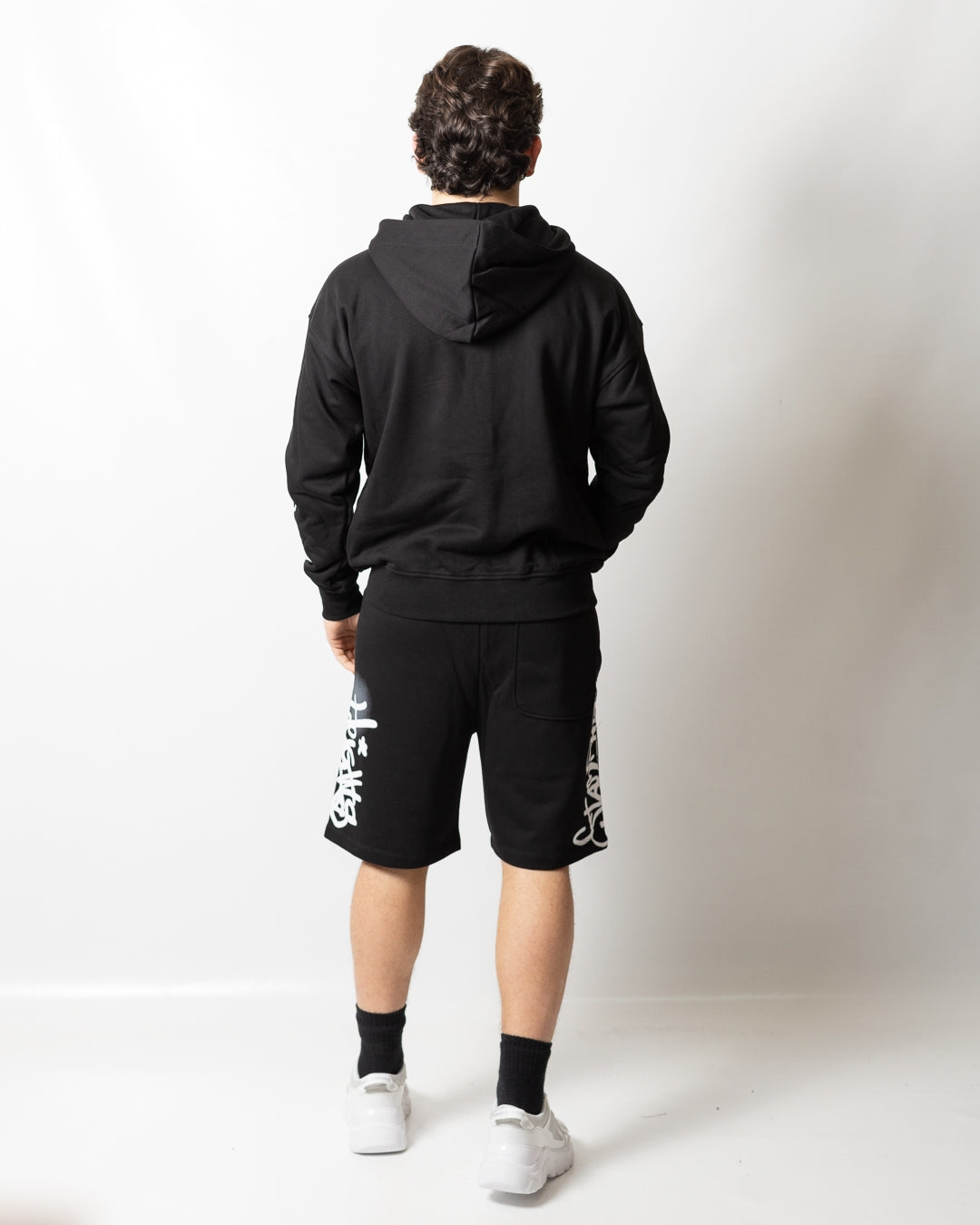 Felpa Comme des Fuckdown fullzip con cappuccio e stampa spray uomo
