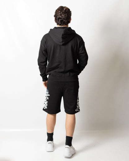 Felpa Comme des Fuckdown fullzip con cappuccio e stampa spray uomo