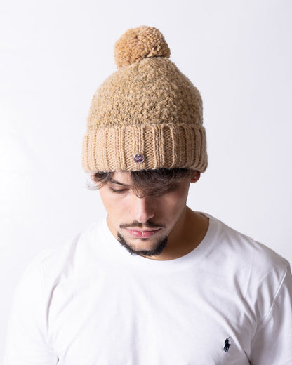 Cappello Colmar in filato bouclè con pompon