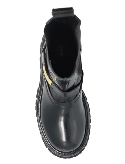 Stivali Moschino slip-on in pelle con placchetta logata uomo