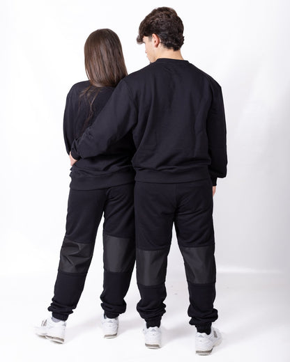 Pantalone GCDS mix di tessuti con logo gommato in rilievo