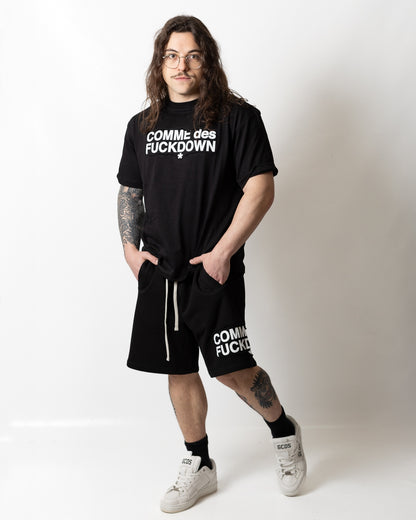 T-Shirt Comme des Fuckdown con taglio e stampa uomo