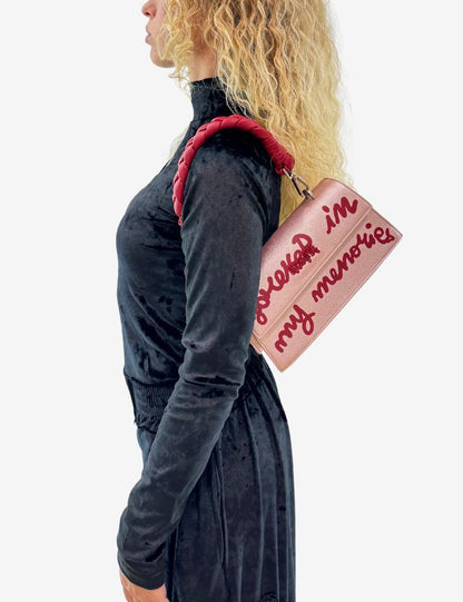 Borsa Disclaimer con manico intrecciato e slogan stampato donna