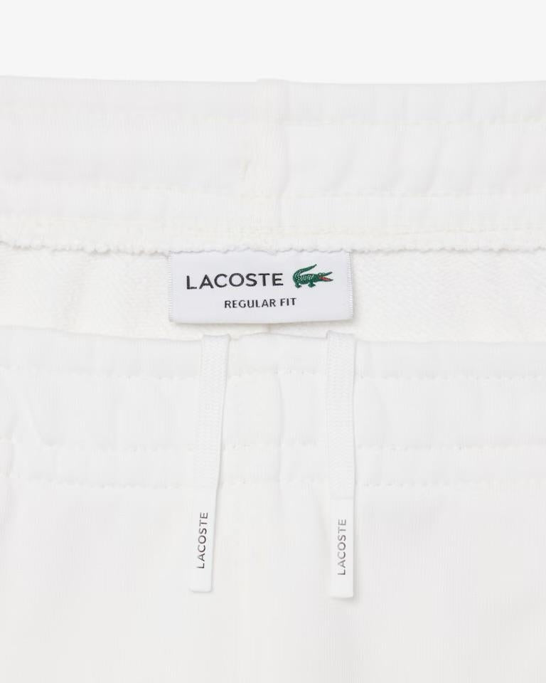 Bermuda Lacoste in felpa con fasce logate uomo