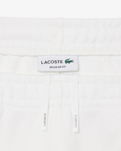 Bermuda Lacoste in felpa con fasce logate uomo